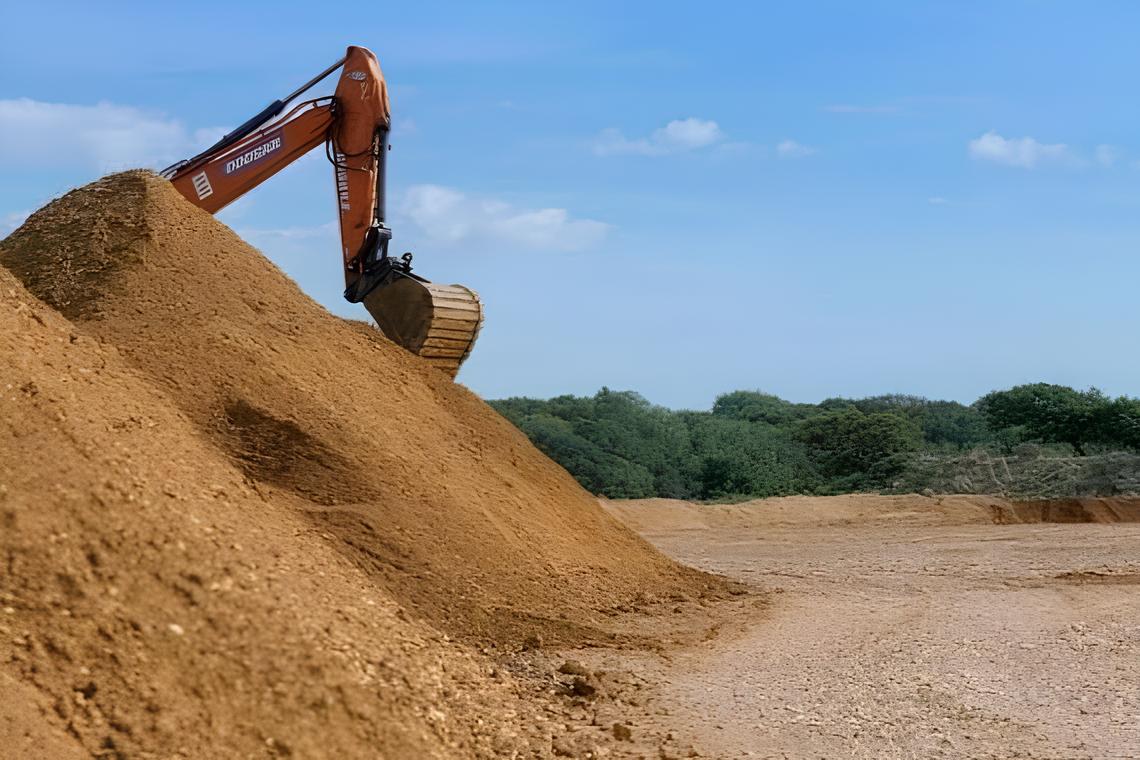 Night view of a mining site with lights illuminating the area